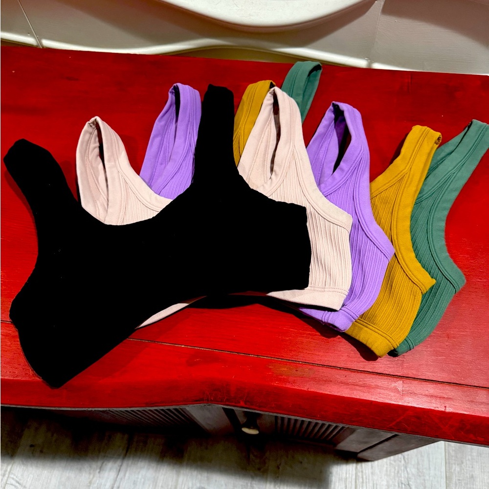 Great find! This bundle of various VS Pink seamless sport bras range between S-L